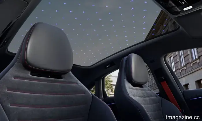 The new electric Mercedes C-Class features its large screen prominently.