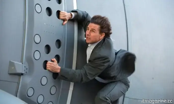 In the latest stunt for Mission: Impossible 8, Tom Cruise is seen hanging upside down from a biplane.