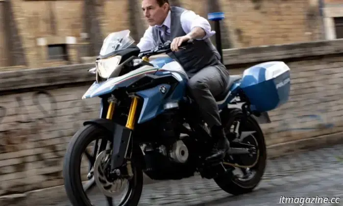 In the latest stunt for Mission: Impossible 8, Tom Cruise is seen hanging upside down from a biplane.