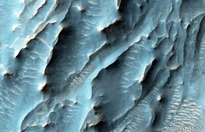 NASA releases breathtaking images of Mars to commemorate the 20th anniversary of the orbiter.